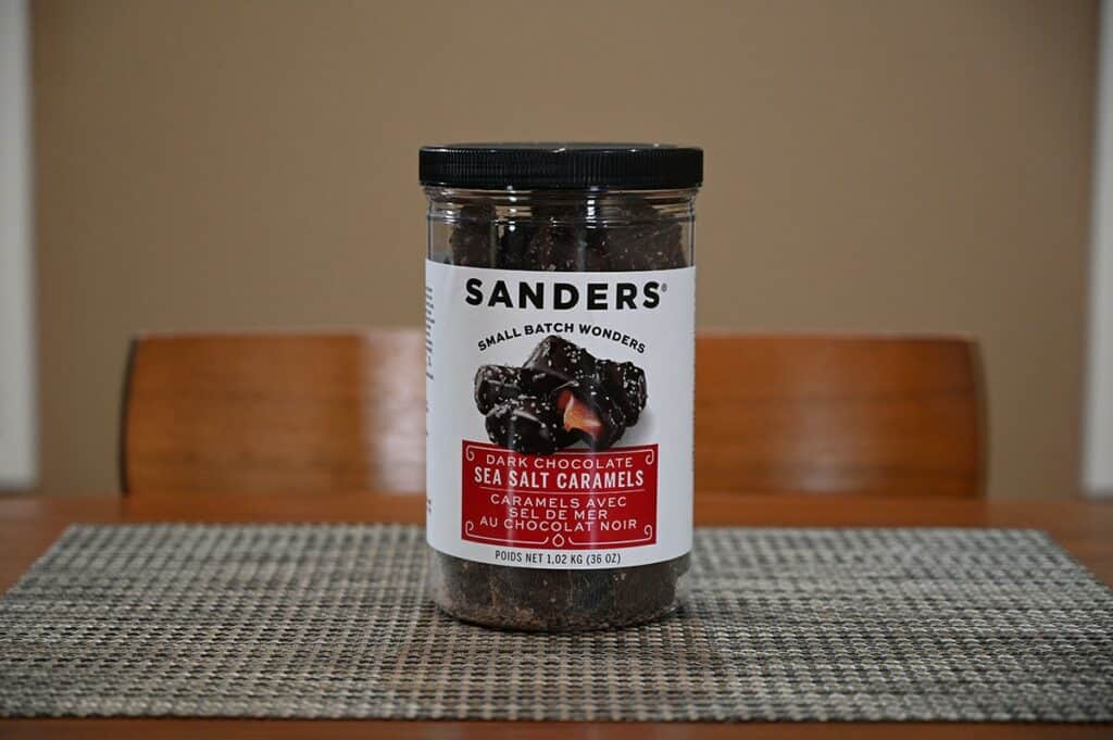 Image of the Costco Sanders Dark Chocolate Sea Salt Caramels container sitting on a table 