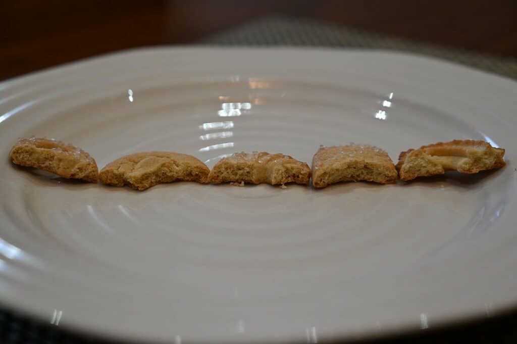 Costco Kelsen Danish Butter Cookies on a plate with bites taken out of each of the five kids of cookies