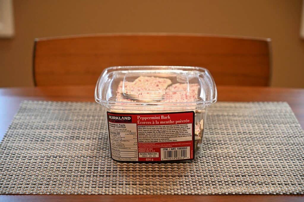 Image of the Costco Kirkland Signature Peppermint Bark container on a table 