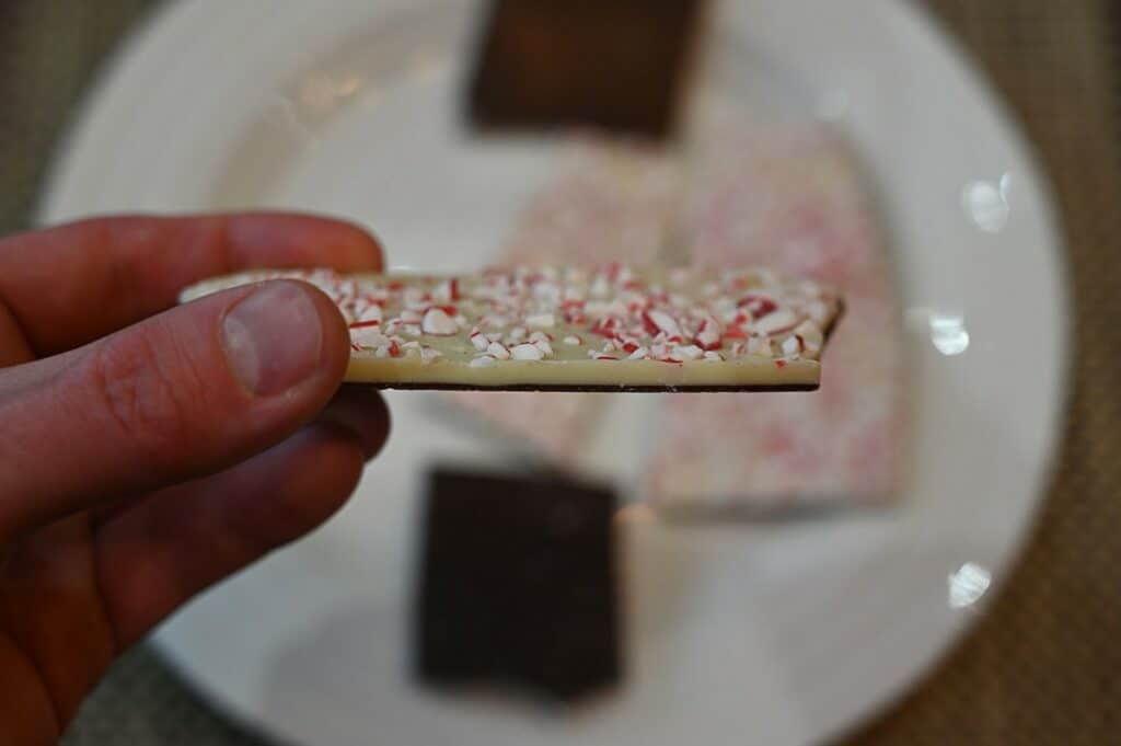 Closeup image of a piece of the Costco Kirkland Signature Peppermint Bark piece 