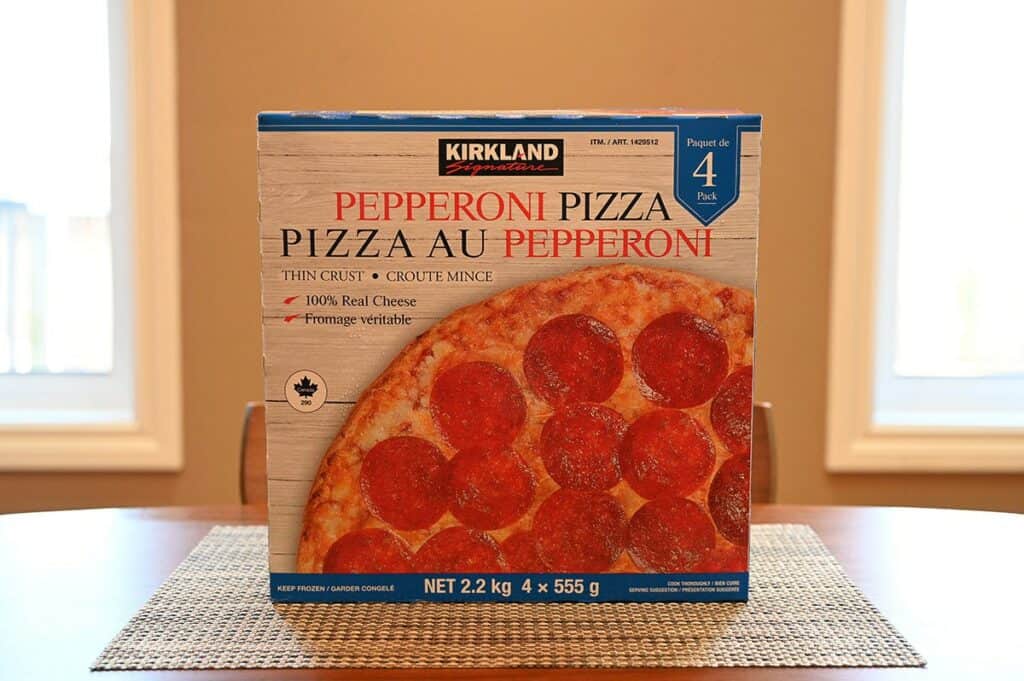 Costco Kirkland Signature Pepperoni Pizza image of pizza box sitting on table
