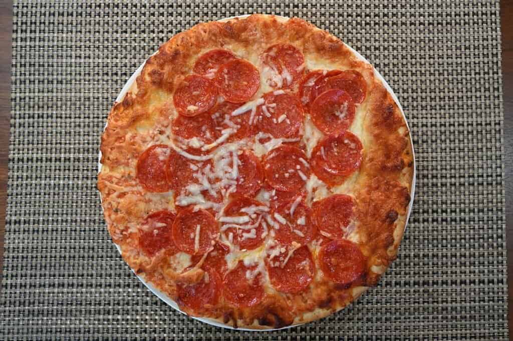 Costco Kirkland Signature Pepperoni Pizza image of baked pizza on a plate 