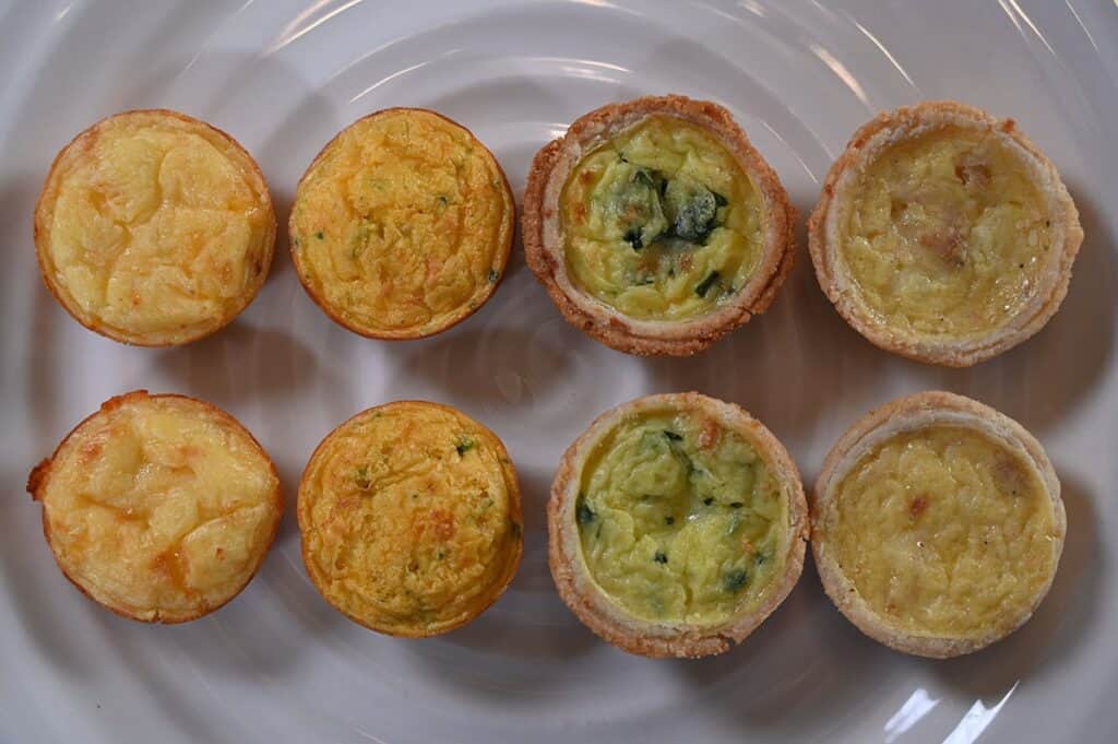 Costco Cuisine Adventures Mini Quiche  image of eight quiche on a plate, two of each kind 