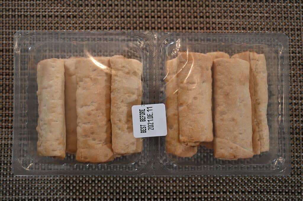 Image of the Costco Prairie Creek Kitchen Sausage Beef Rolls in their plastic packaging that comes inside the box. Five rolls per plastic section. 