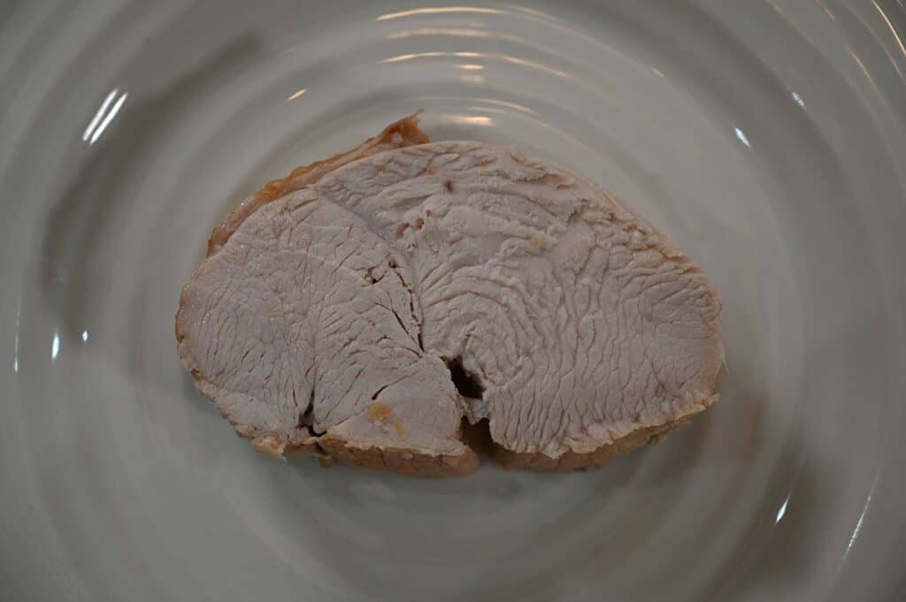 Image of a slice of Costco Lilydale Turkey Breast Roast carved and on a plate 