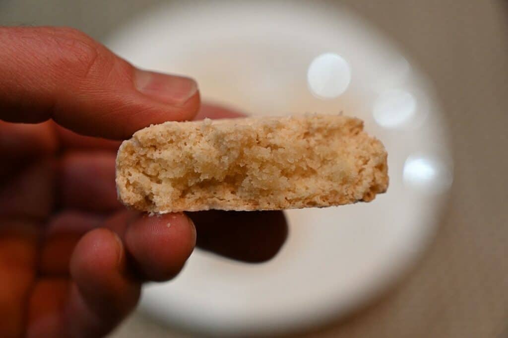 Closeup image of the Costco Di Manno Soft Amaretti Almond Cookie with a bite taken out of it