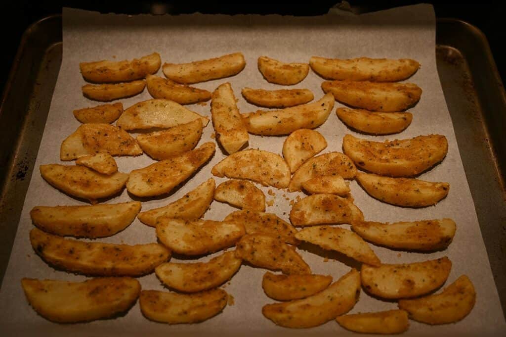 Image of the Costco Kirkland Signature Chicken Burger Meal Kit potato wedges after cooking them in the oven 