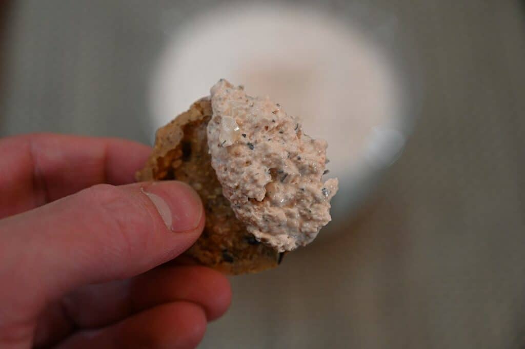 Close-up image of Costco La Terra Fina Smoked Sockeye Salmon Dip on a cracker