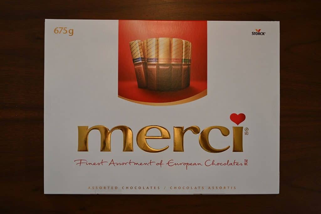 Top-down photo of the Costco Merci European Chocolates box sitting on a table. The Merci European Chocolates are another Costco Christmas chocolate. 