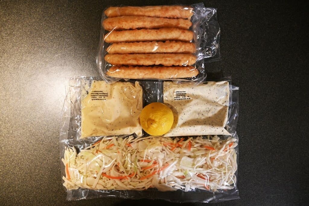 Costco Kirkland Signature Fish & Chips Meal Kit contents sitting on a counter