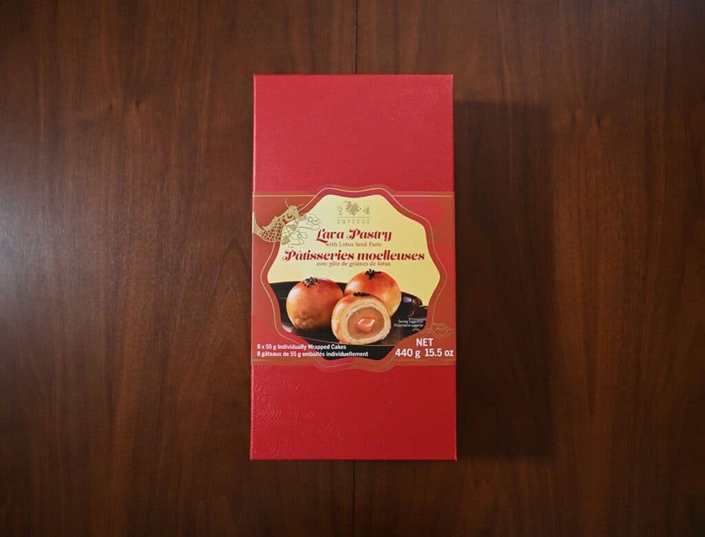 Costco Emperor Lava Pastry with Lotus Seed Paste box sitting on a brown table