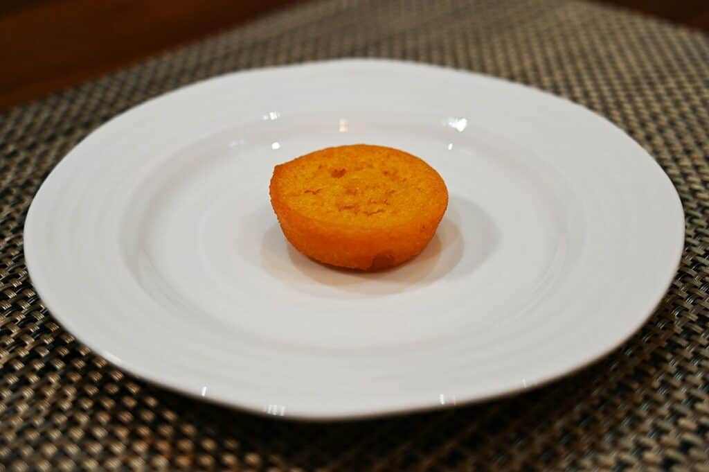 One Costco Sugar Bowl Bakery Mango Cake on a white plate