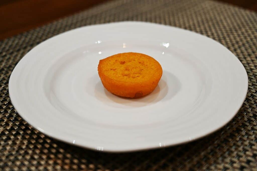 One Costco Sugar Bowl Bakery Mango Cake on a white plate
