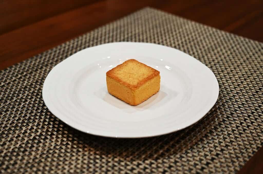 Costco Isabelle Pineapple Cake unwrapped from package on a white plate. 