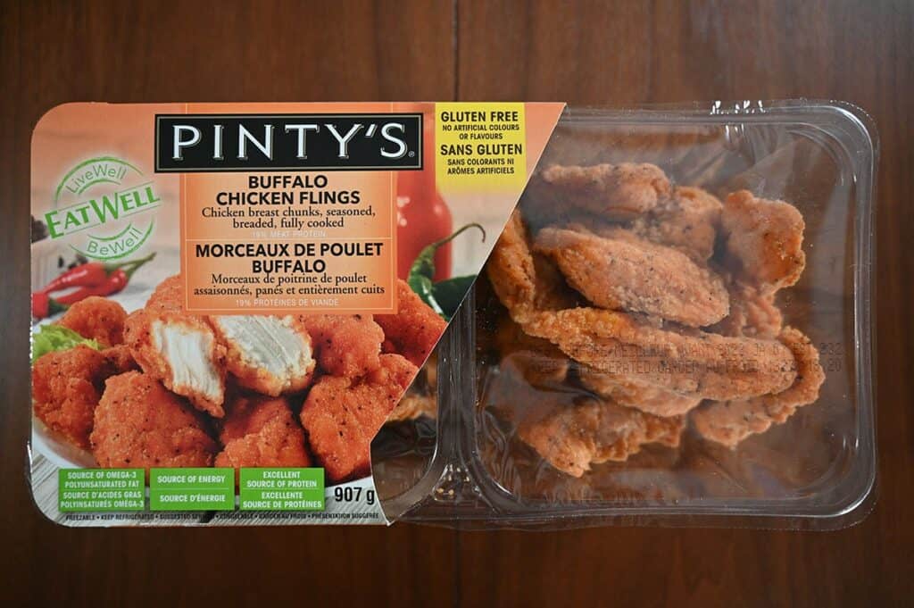 Image of Costco Pinty's Buffalo Chicken Flings sitting on a table, top down image. 