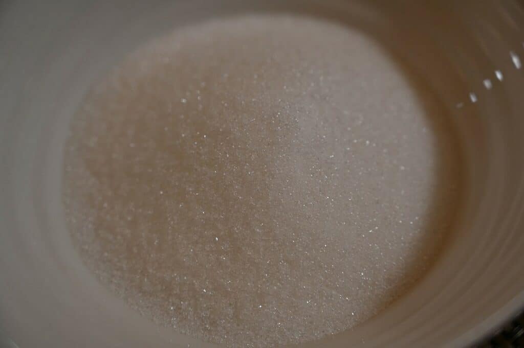 Costco Volupta Erythritol & Monk Fruit Sweetener poured into a white bowl
