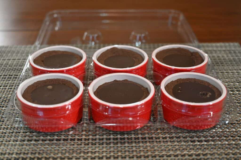 Costco Delici Belgian Chocolate Soufflé six soufflés in the plastic packaging sitting on a table, not heated.