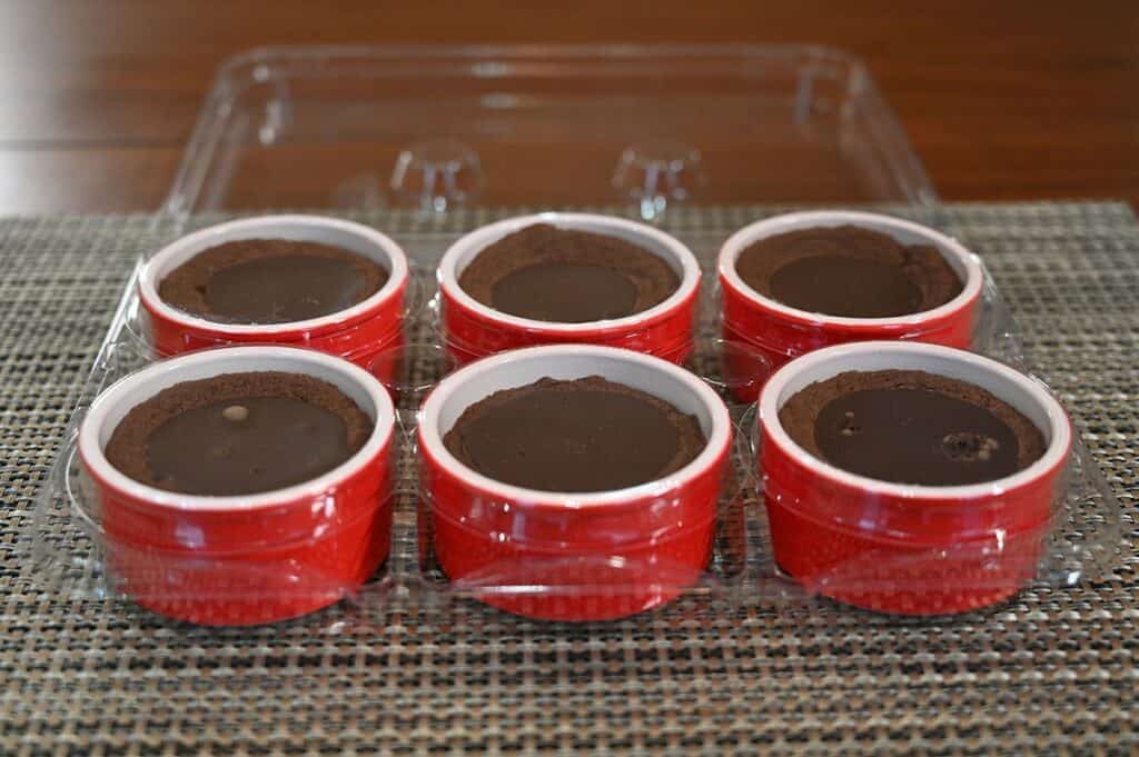 Costco Delici Belgian Chocolate Soufflé six soufflés in the plastic packaging sitting on a table, not heated.