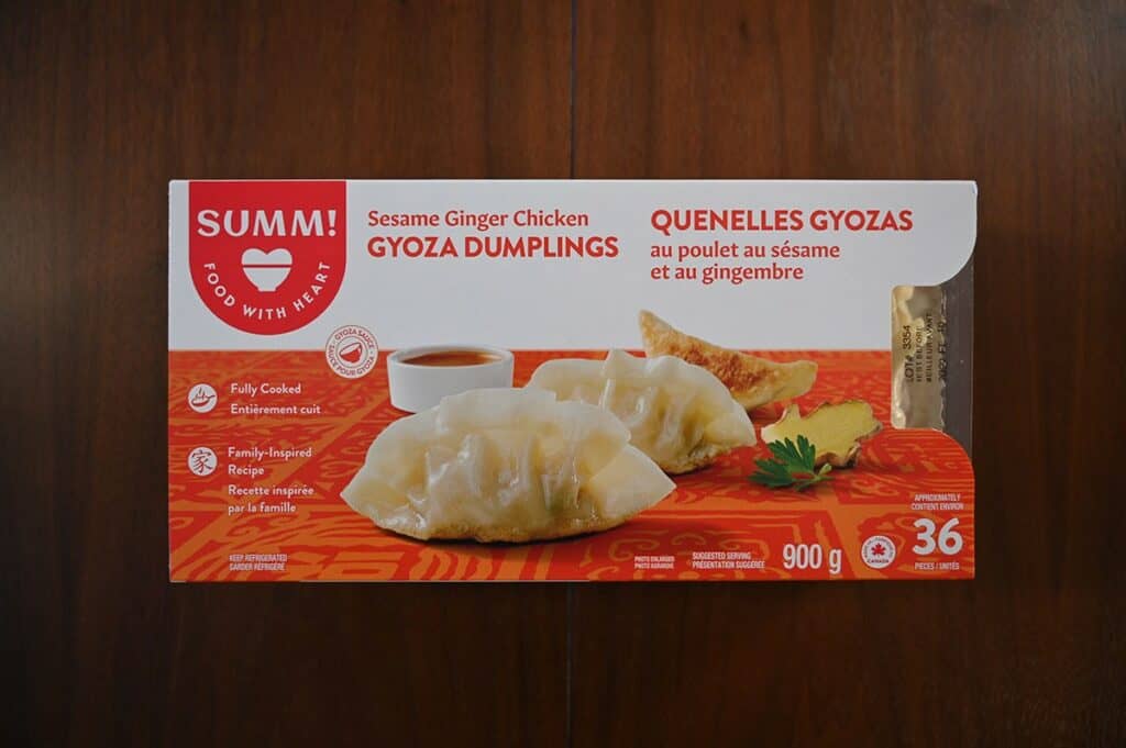 Costco Summ! Sesame Ginger Chicken Gyoza Dumplings box on a table, top down image. 