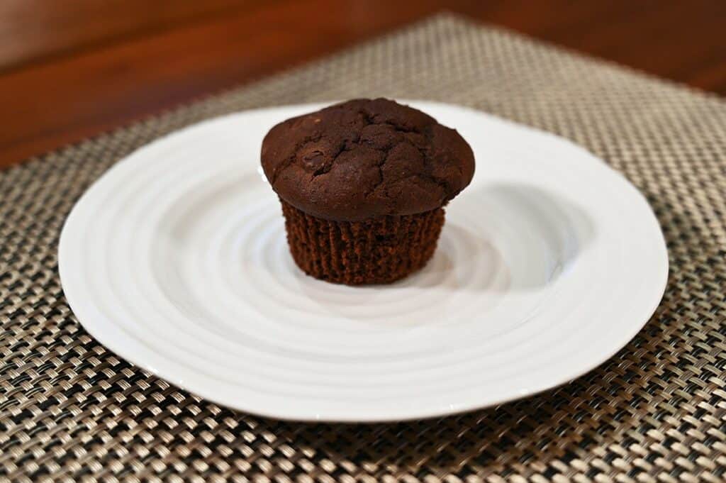 Costco Bread Garden Double Chocolate Keto Muffin unwrapped from packaging and sitting on a plate. 