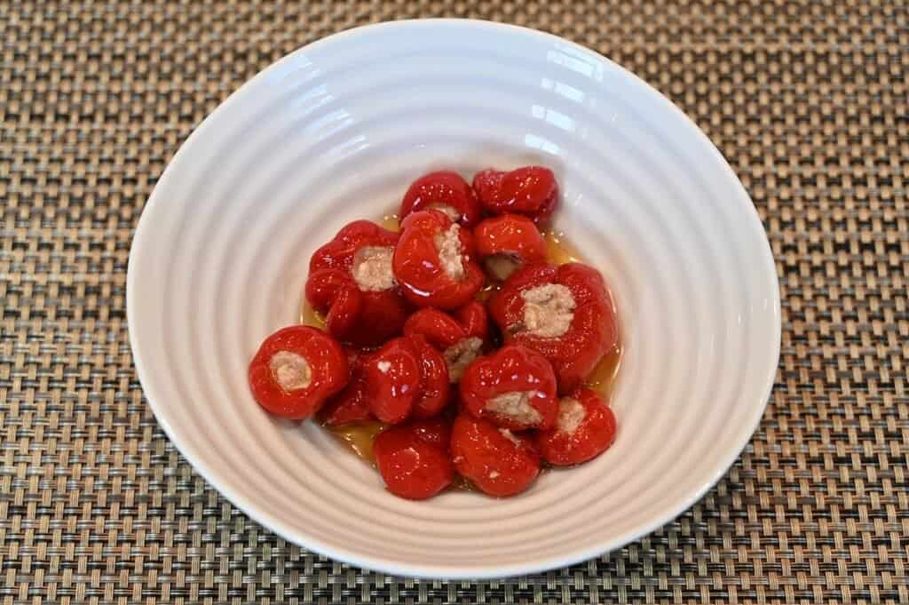 Costco Tasso's Papandoro Peppers Stuffed With Feta & Kalamata Olives poured into a white bowl. 