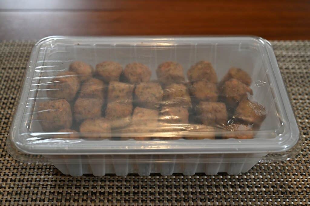 Costco Don Lee Farms Organic Veggie Bites with the outer cardboard taken off, so the plastic container is visible, sitting on a table. 
