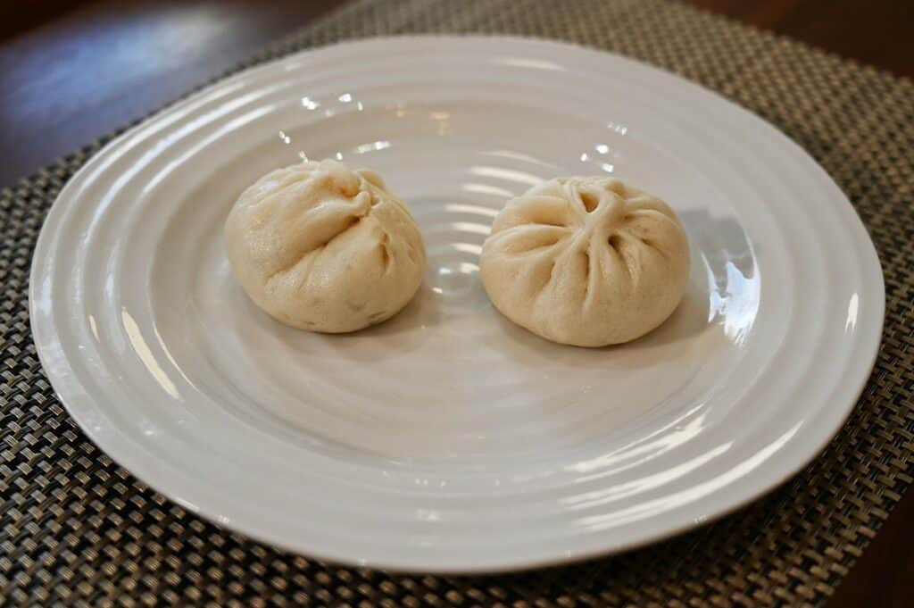 Costco Made Fresh Foods BBQ Pork Buns two buns on a plate after heating. 