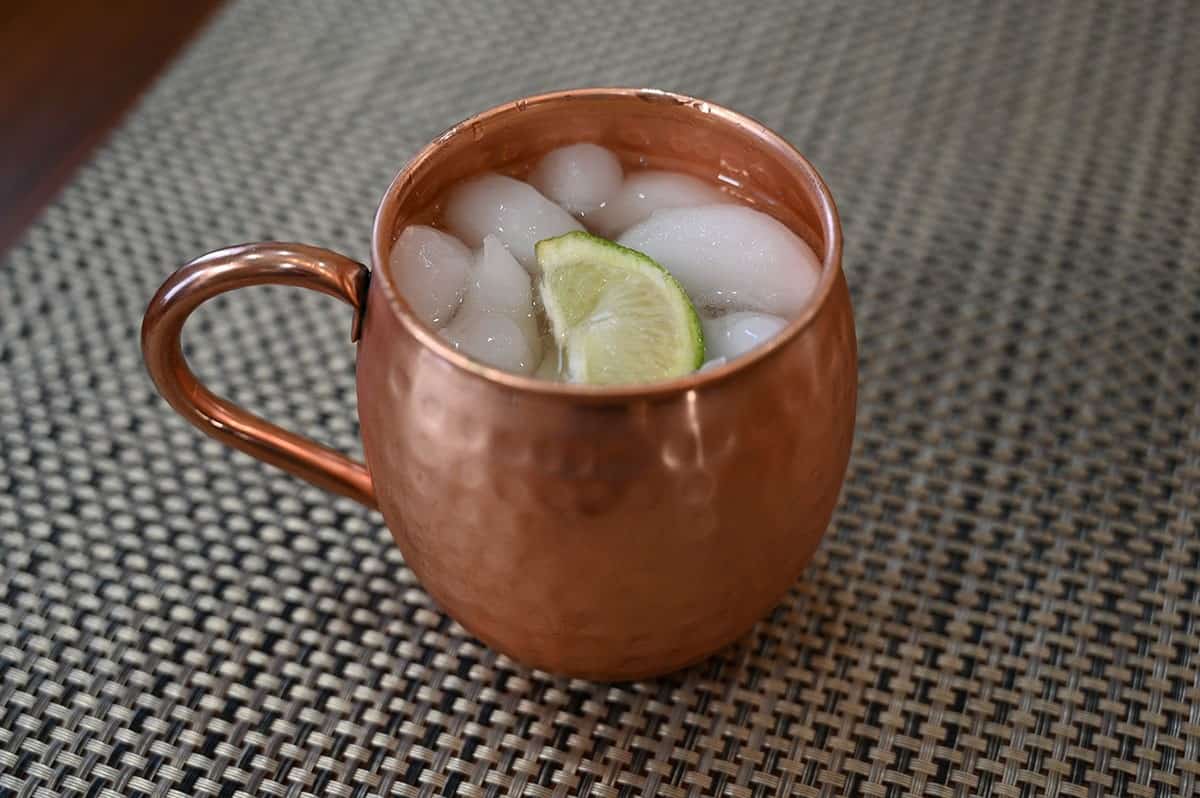 Image of a Moscow Mule in a copper cup made with Costco vodka. 