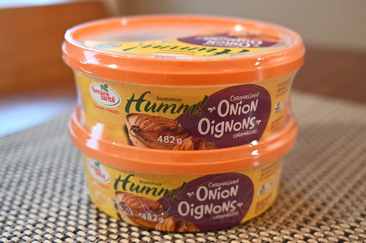 Costco Fontaine Santé Humm! Caramelized Onion Hummus two pack sitting on a table. 