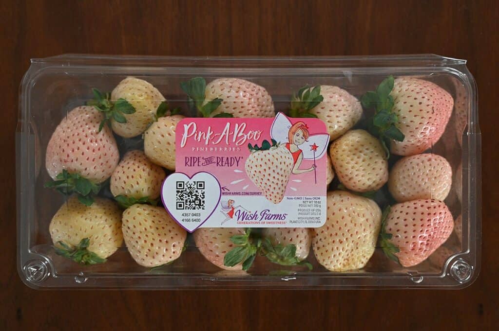 Costco Wish Farms Pink-A-Boo Pineberries container on a table. 