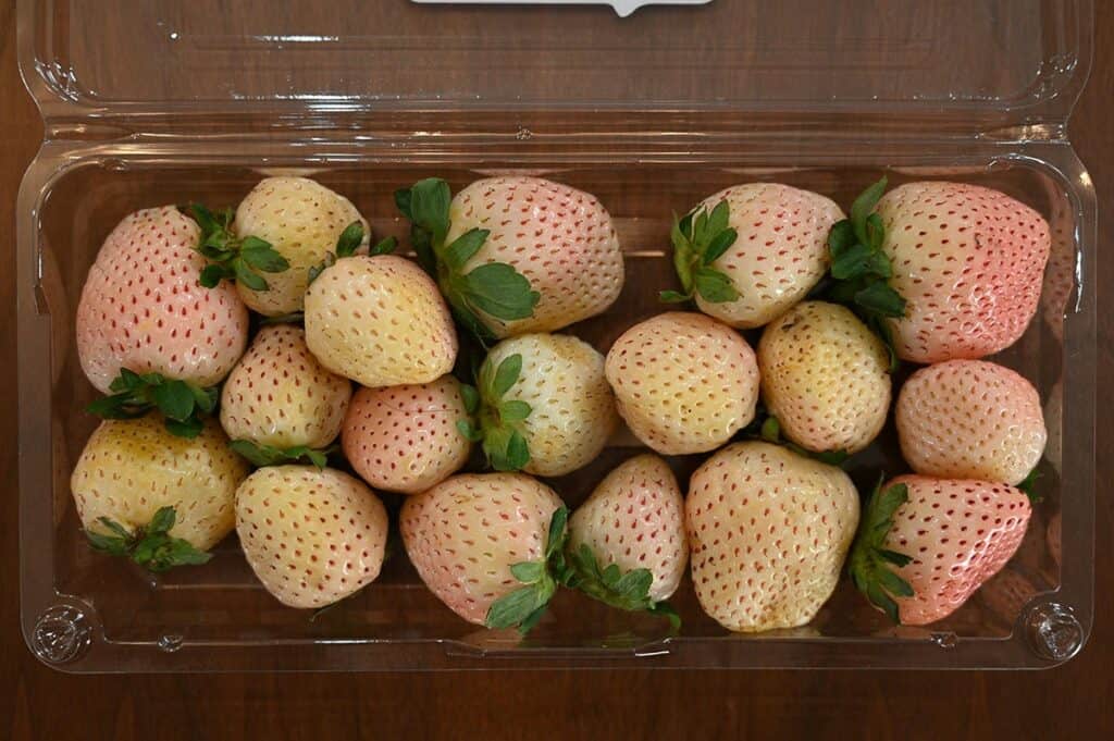 Costco Wish Farms Pink-A-Boo Pineberries container with lid off so you can see the pineberries. 