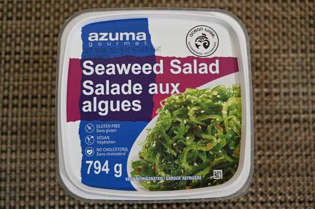 Costco Azuma Seaweed Salad lid on a placemat, top down image. 