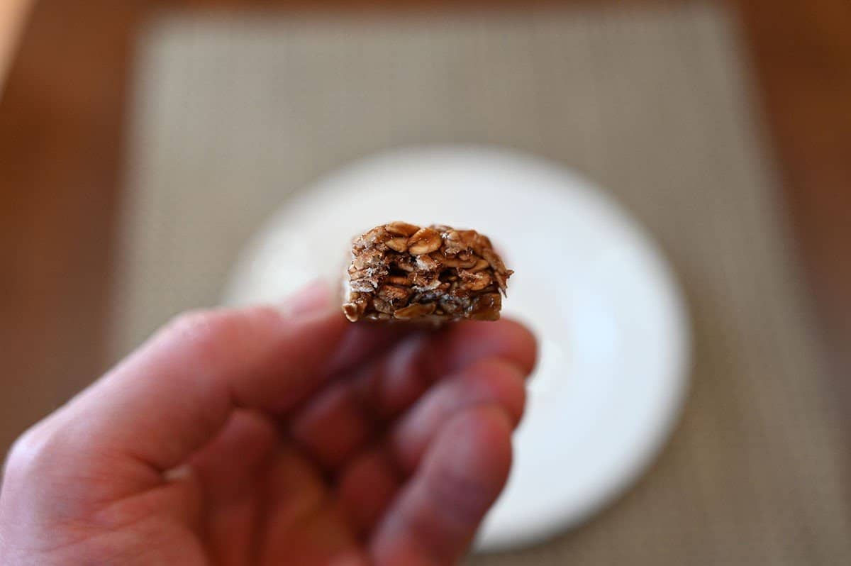 Side image of a Costco MadeGood Chocolate Chip Granola Bar with a bite taken out of it.