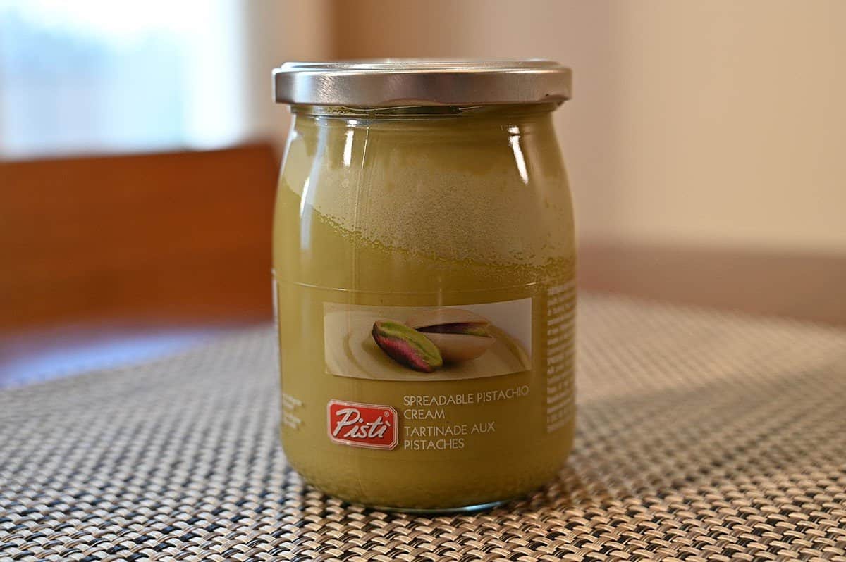 Costco Pisti Spreadable Pistachio Cream jar on a table. 