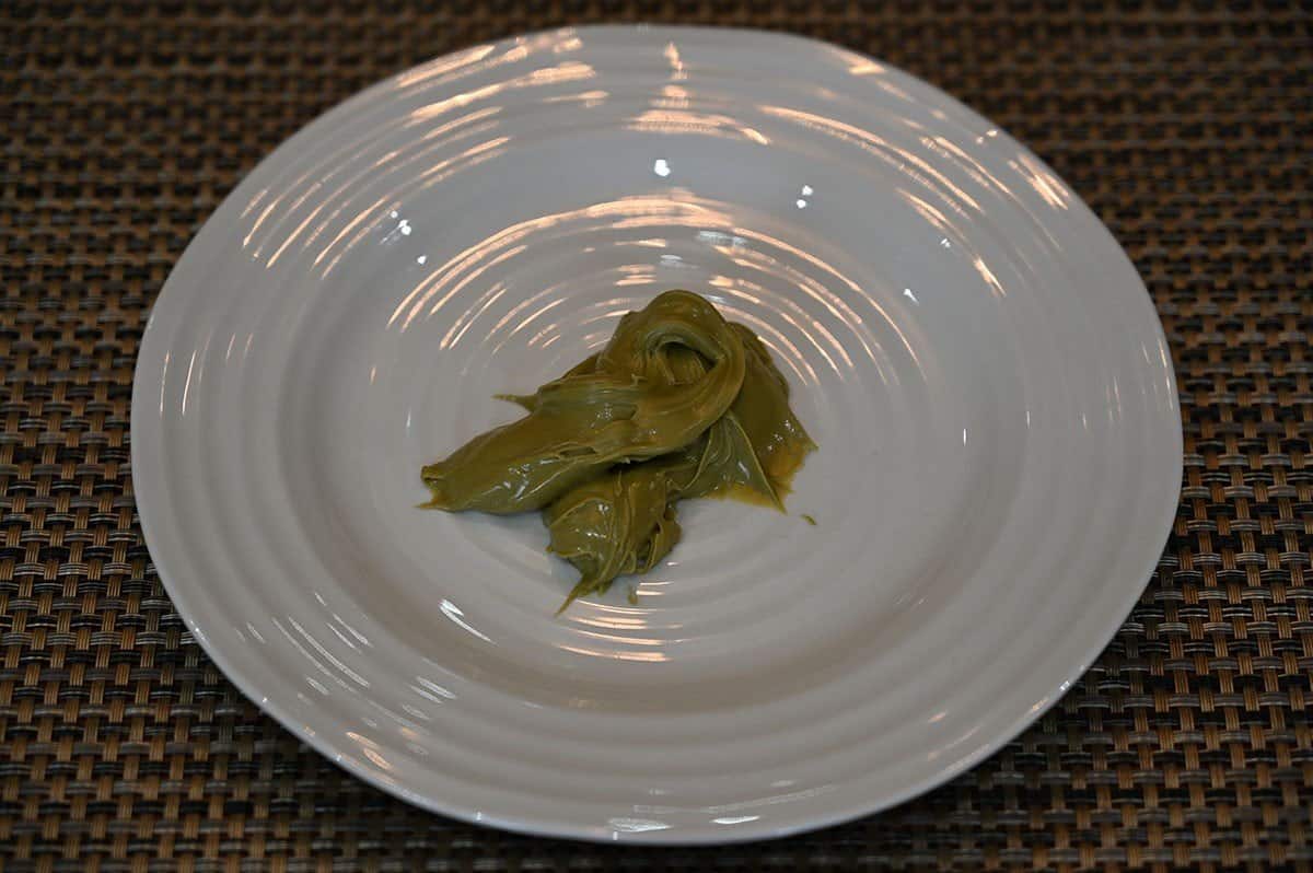 Image of the pistachio cream scooped on a plate, pictured is 35 gram serving. 