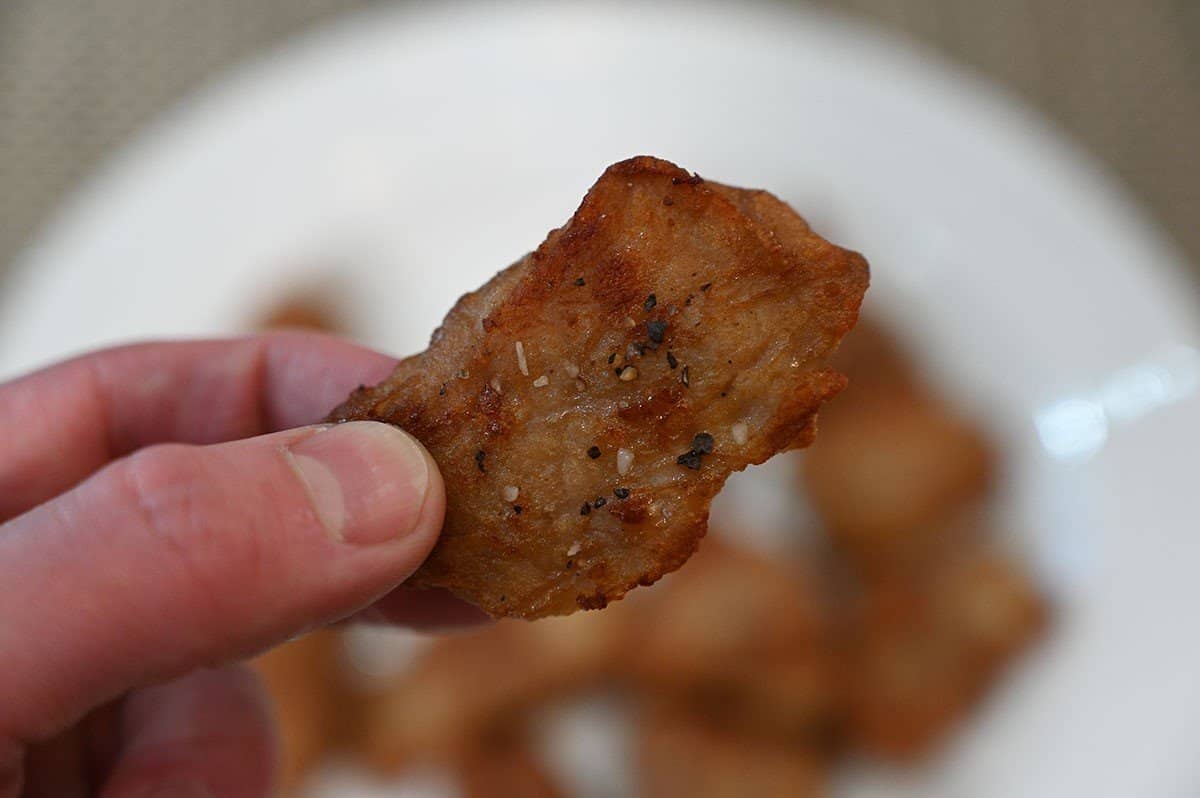 Closeup image of one cooked dry garlic rib, before eating. 