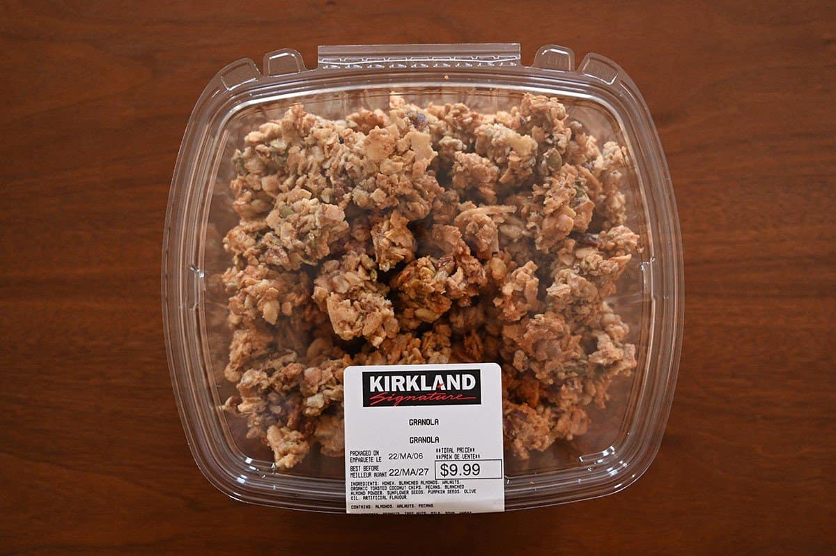 Costco Kirkland Signature Granola container sitting on a table, top down image. 