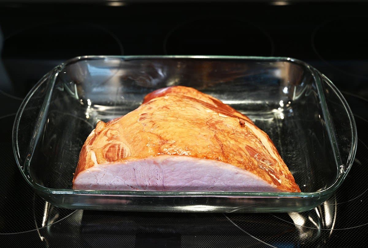 Image of the ham in the baking dish before being put in the oven. 