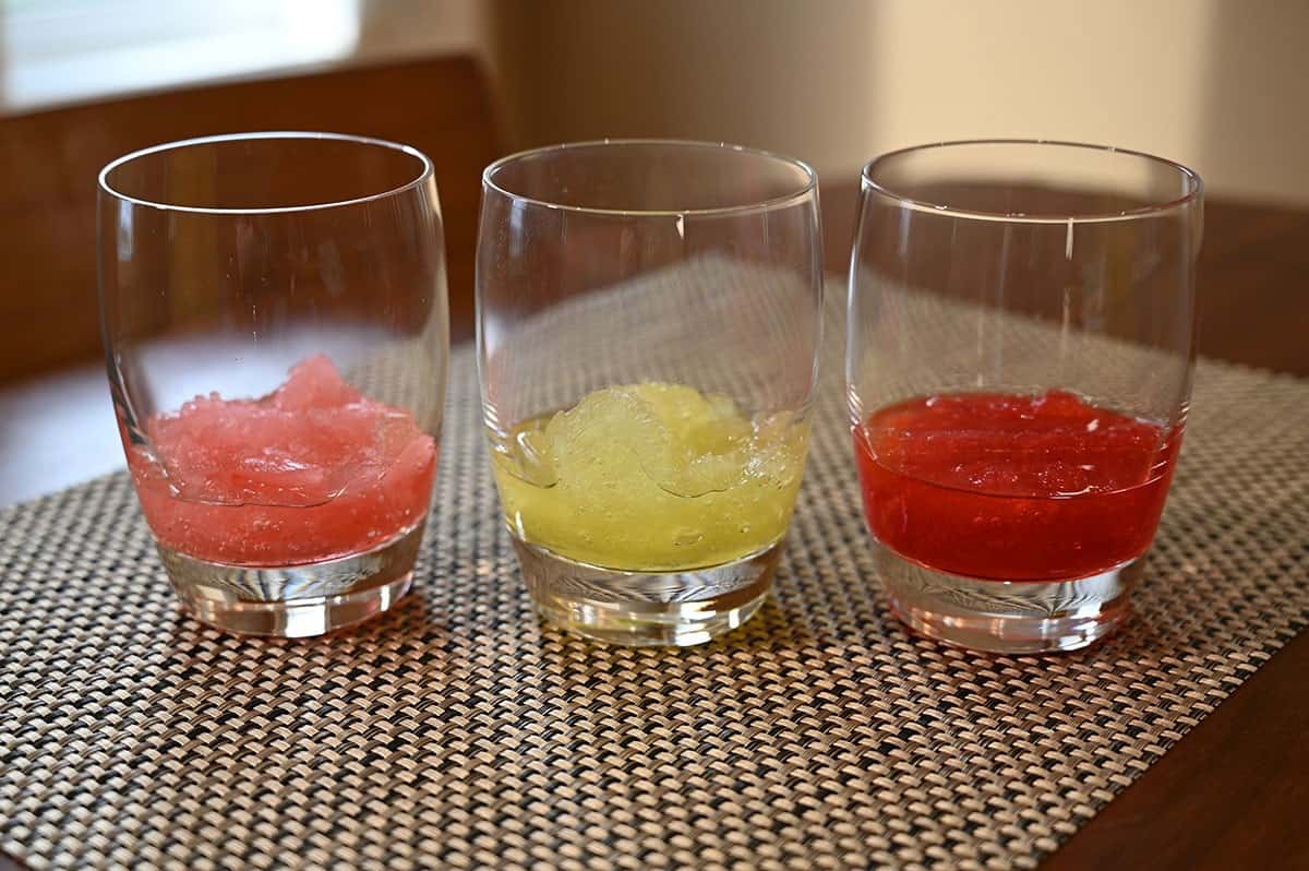 Image of the Costco Kirkland Signature Frozen Cocktails poured into glasses sitting on a table. 