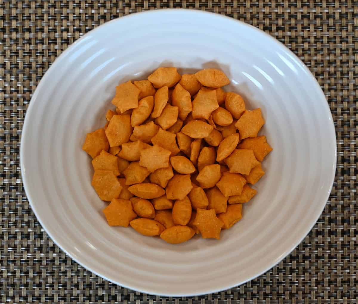 Costco MadeGood Star Puffed Crackers poured into a white bowl, top down image.  