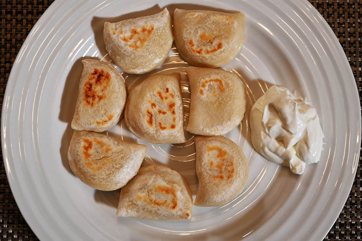 Costco Naleway Potato and White Cheddar Perogies cooked and served on a white plate. 