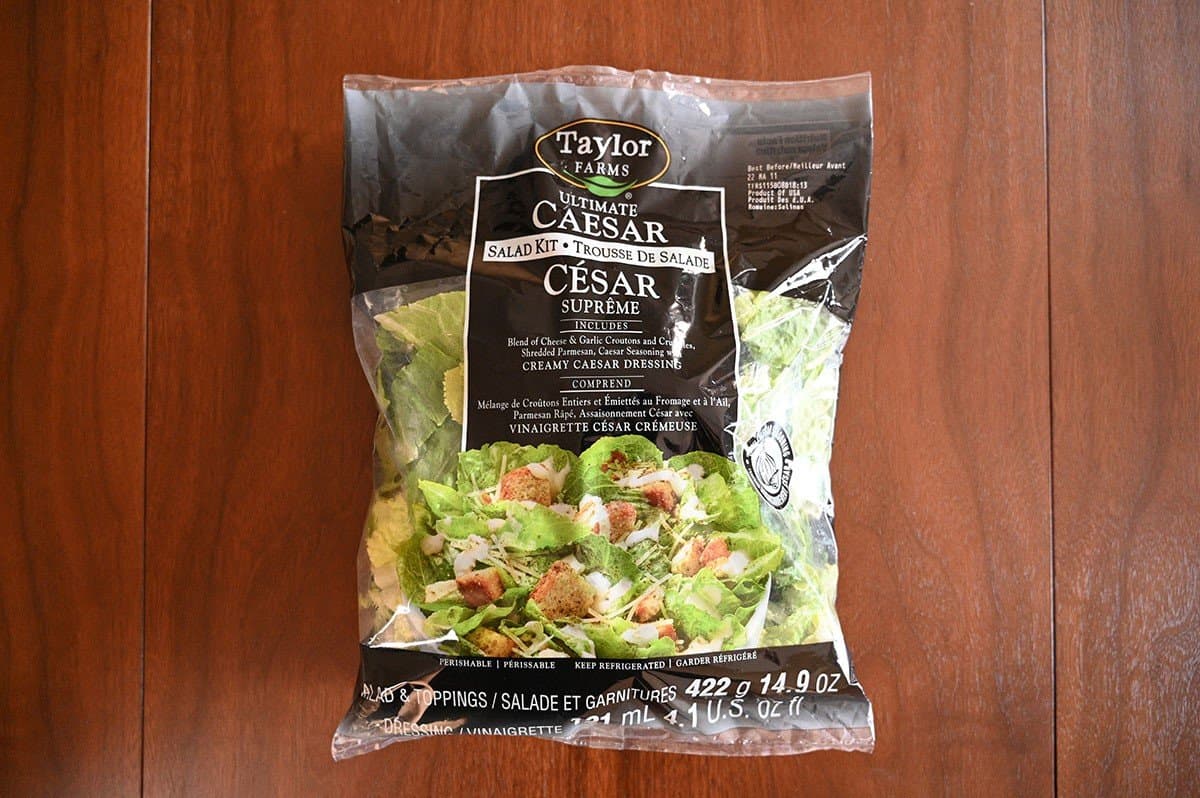 Costco Taylor Farms Ultimate Caesar Salad Kit bag on a table. 