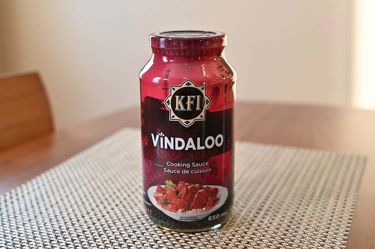 Costco KFI Vindaloo Cooking Sauce single jar sitting on a table. 