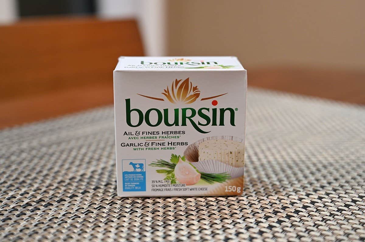 Box of Costco Boursin Garlic & Fine Herbs flavor sitting on a table. 