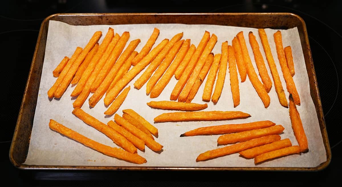 Image of Costco Russet House Sweet Potato Fries on a baking tray after being cooked in the oven. 