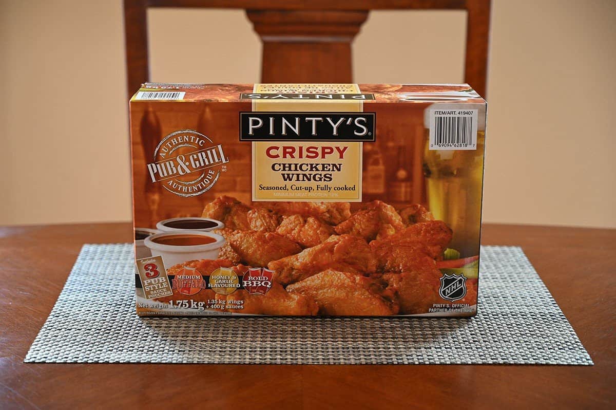 Costco Pinty's Crispy Chicken Wings box sitting on a table. 