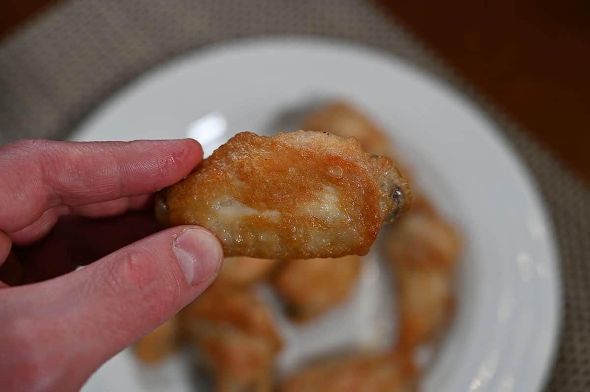 Closeup image of one Costco Pinty's Crispy Chicken Wing. 