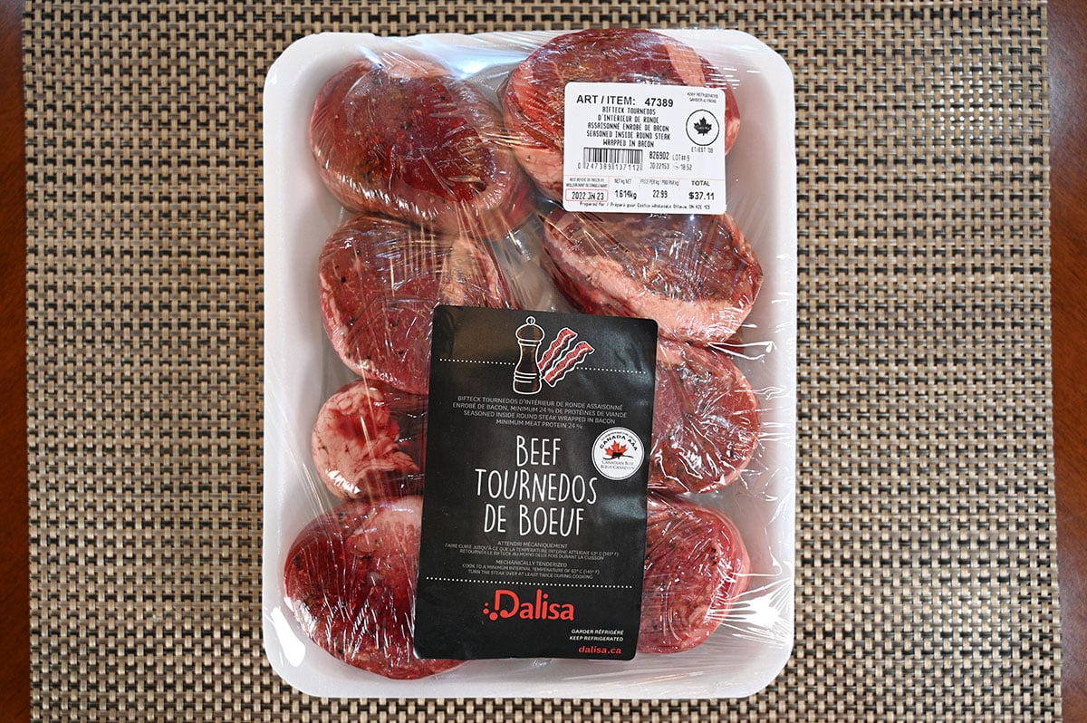 Costco Dalisa Beef Tournedos in package sitting on a table, top down image.