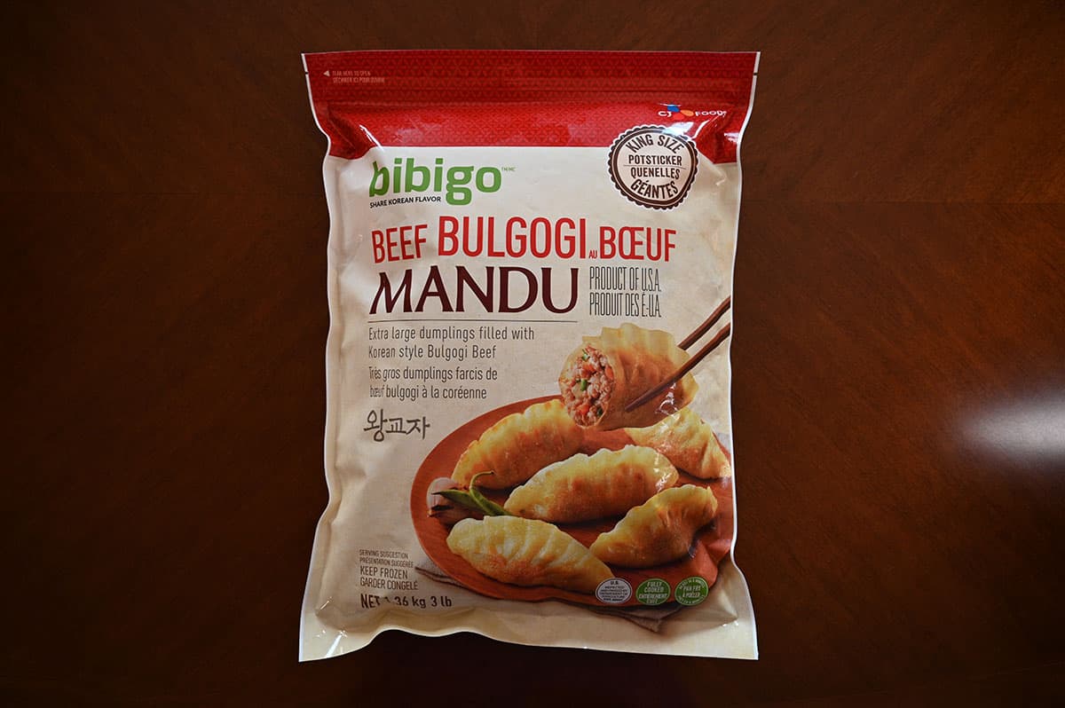 Costco Bibigo Beef Bulgogi Mandu bag on a table. Top down image.