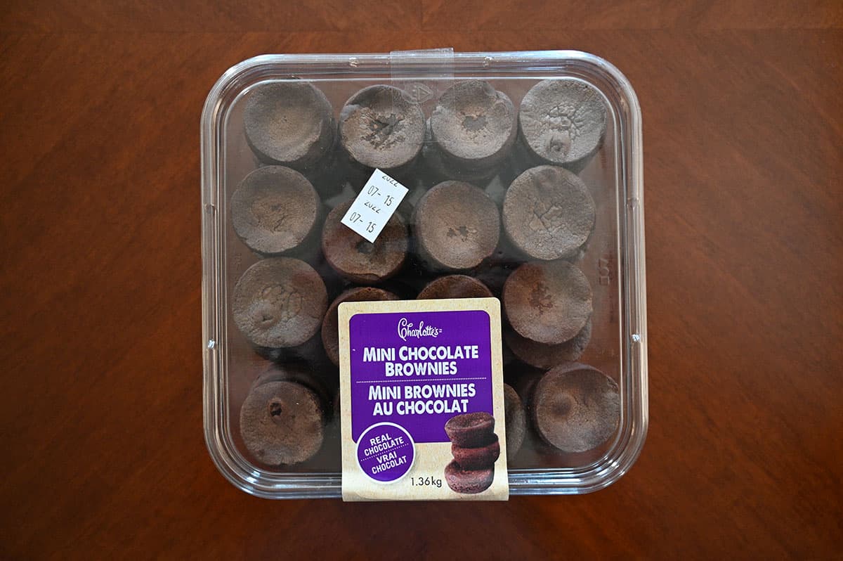 Costco Charlotte's Mini Chocolate Brownies container sitting on a table, top down image.